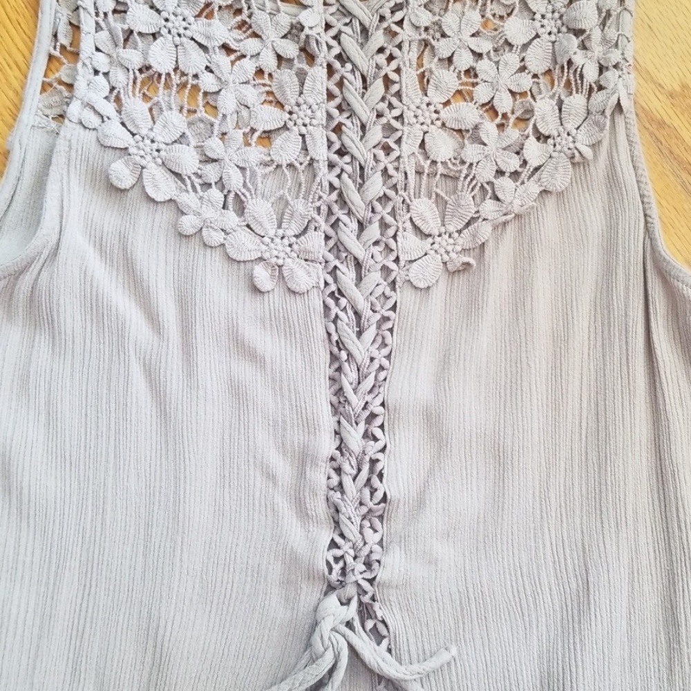 Unique sleeveless top with lace up back. - Picture 4 of 8